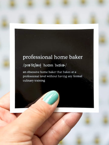 Professional home baker sticker being held.